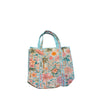 A small tote bag with a colorful tropical floral and palm tree print, featuring light blue braided looking handles, set against a plain white background.